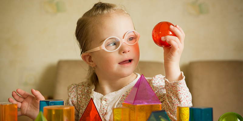 A child engaging in early learning activities